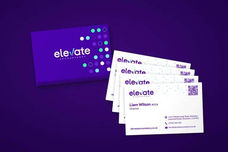 A stack of purple Elevate Accountancy business cards beside a fan of white card backs for the team